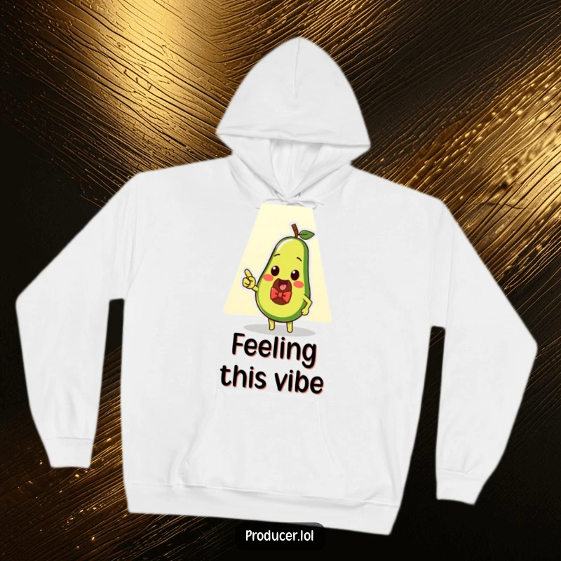 Funny avocado star hoodie, a cozy garment featuring a dapper avocado pointing at a spotlight, celebrating stardom and comfort.