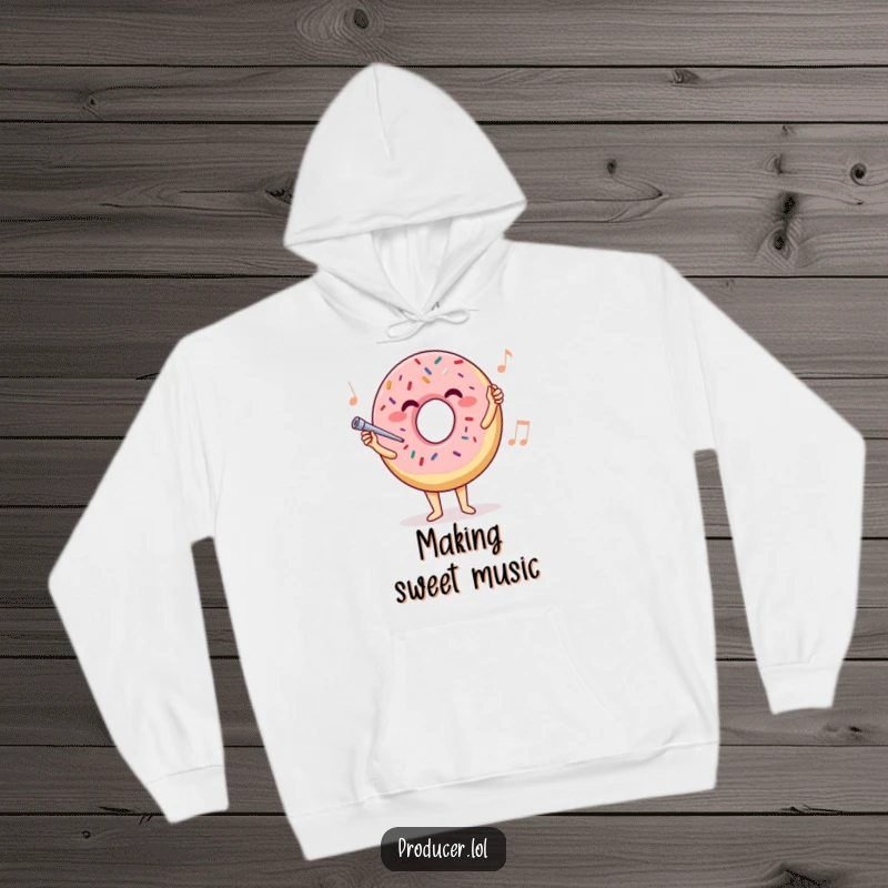 Funny donut conductor hoodie, a warm and cozy garment with a joyful donut leading an orchestra, perfect for music lovers.