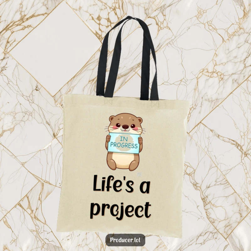 Funny otter tote bag, smiling otter, holding 'In Progress' sign, sturdy and stylish, daily use.